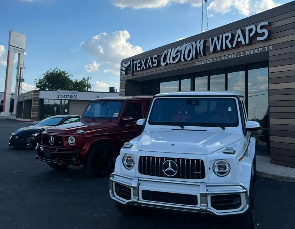 Two Mercedes G Wagons finished for a San Antonio dealership outside the Texas Custom Wraps shopfront